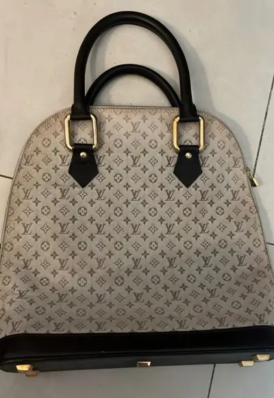 Bolso Louis Vuitton Mini Lin Alma Haut y Portacosmeticos
