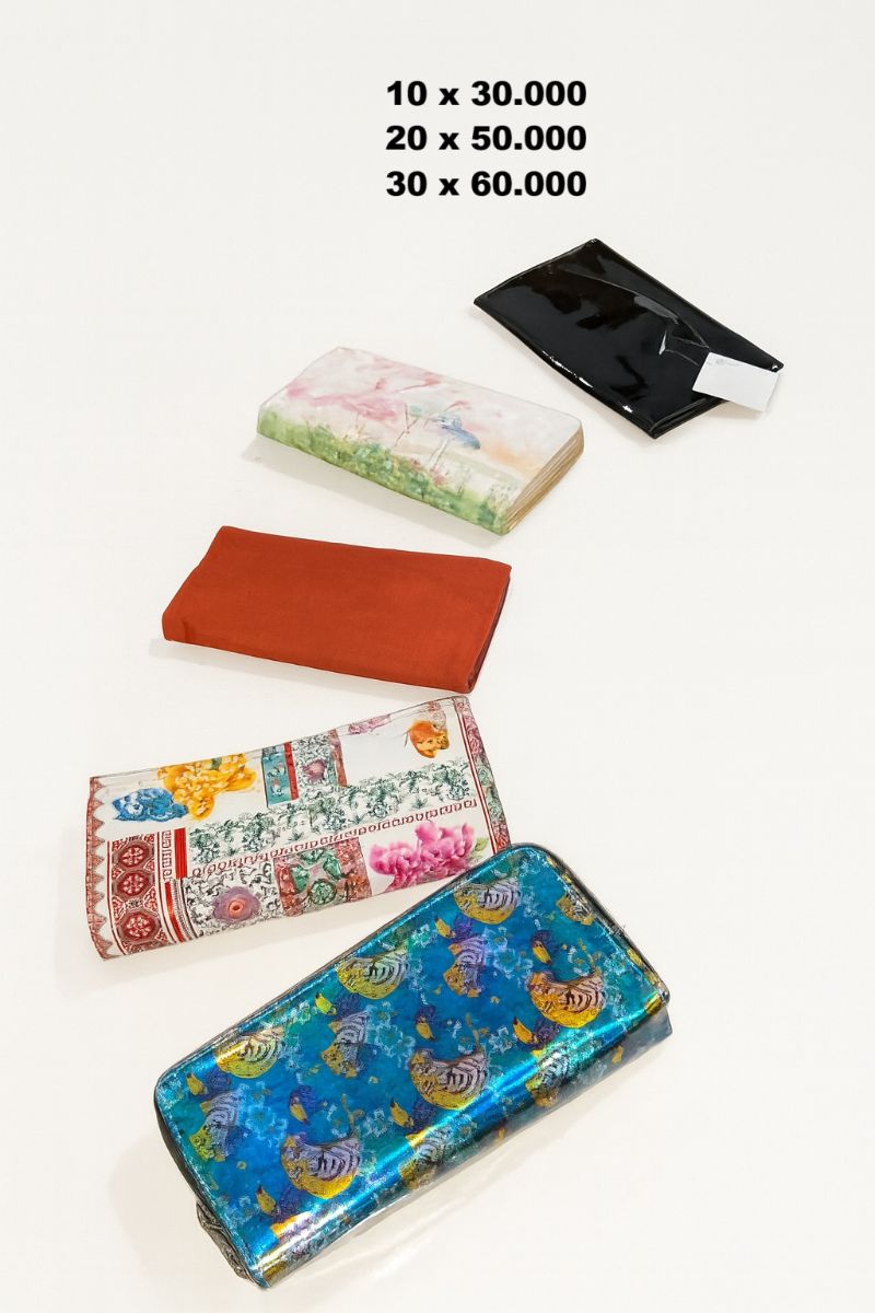 Carteras, mochilas, billeteras por mayor en liquidación 50% off