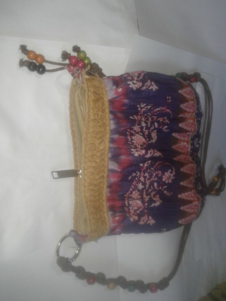 2 carteras con lazo y cierra  de tela con cierre  