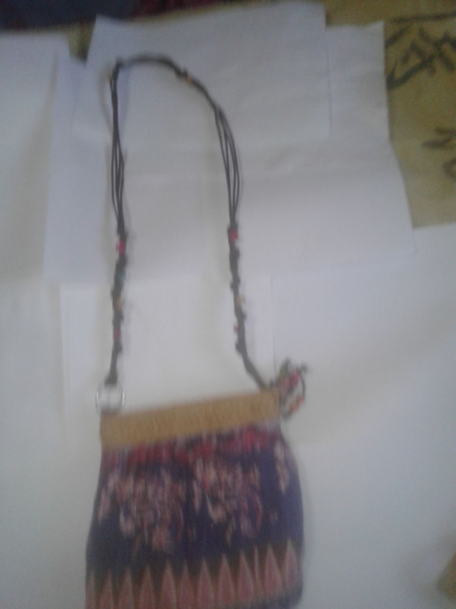 2 carteras con lazo y cierra  de tela con cierre  