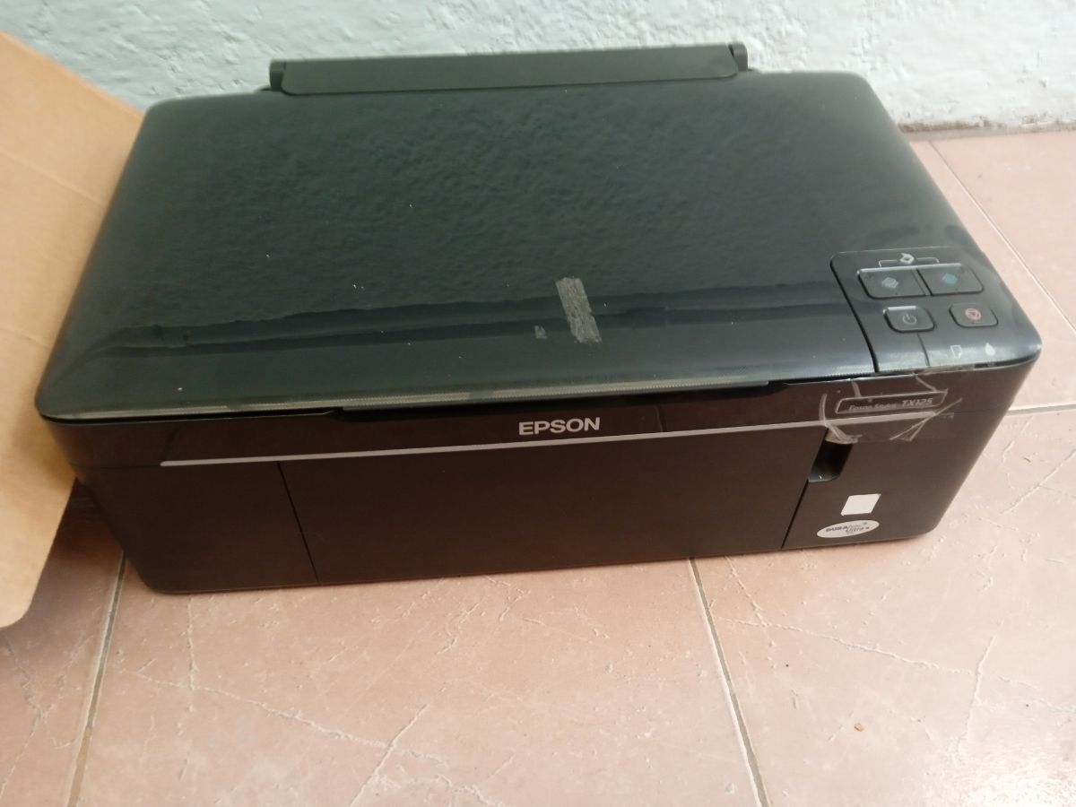 Impresora Epson Tx 125 con escáner para repuestos o reparar