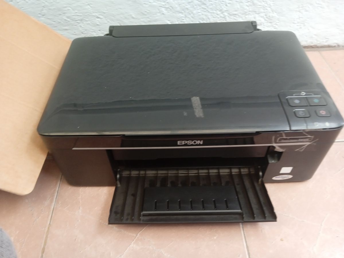 Impresora Epson Tx 125 con escáner para repuestos o reparar