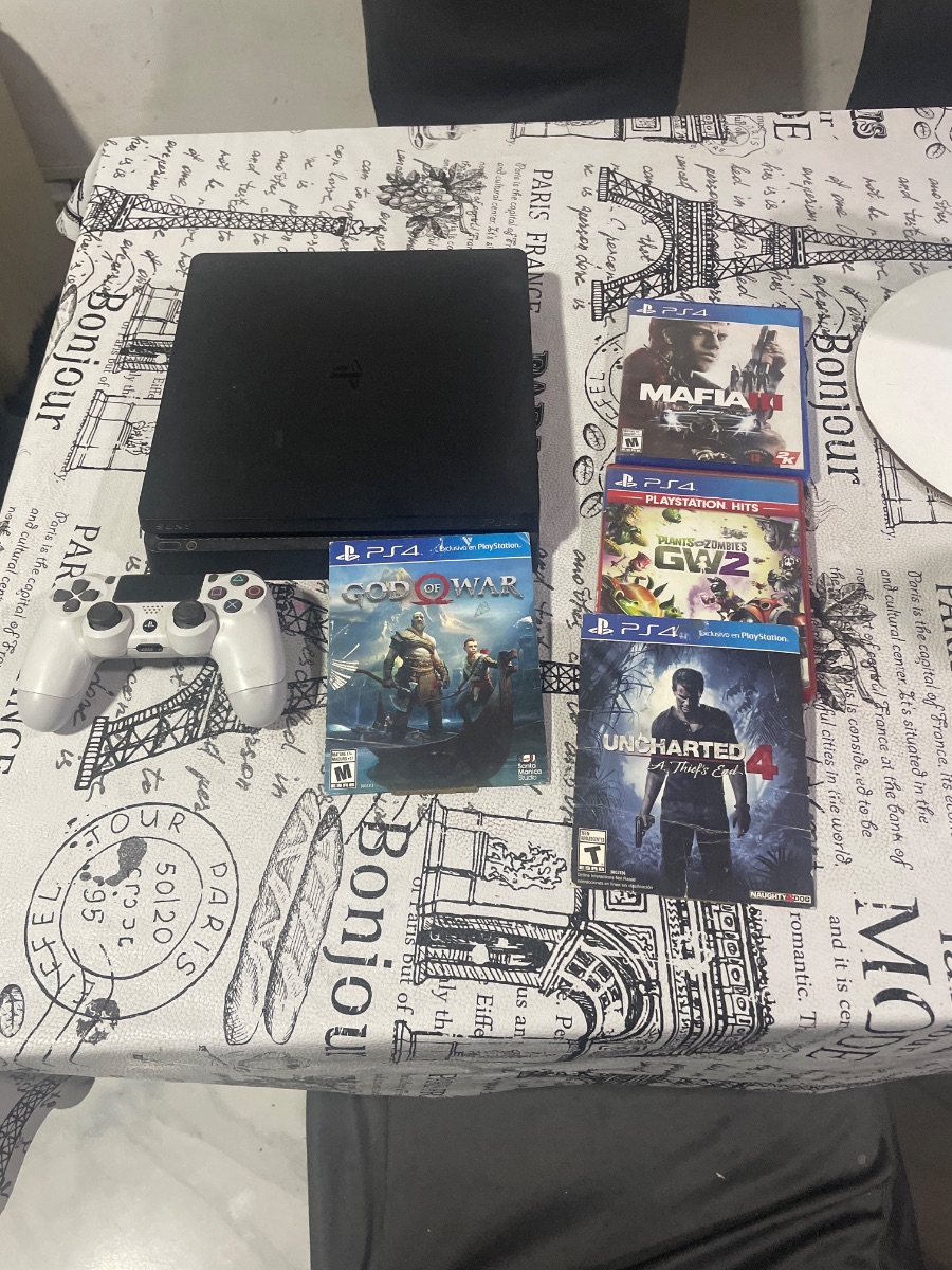 Ps4 slim  + jostick original(detalle) + cable de alimentación 