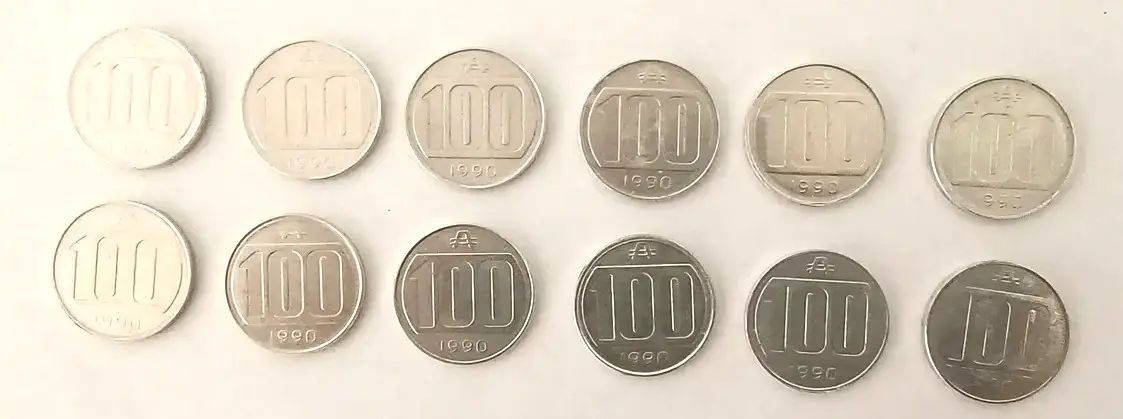 12 monedas de Austral año 1990