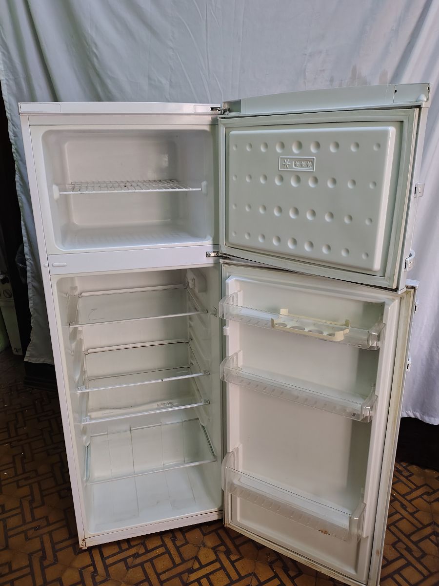 Heladera con Freezer Top House