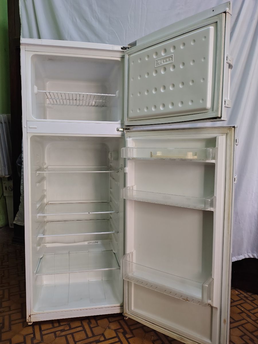 Heladera con Freezer Top House