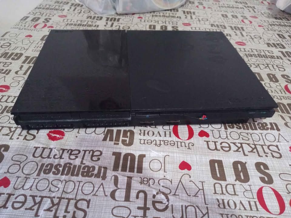 Ps2 Slim completa + joystick + 20 juegos