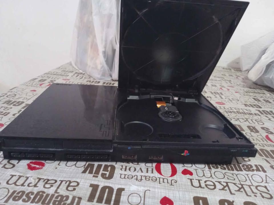 Ps2 Slim completa + joystick + 20 juegos