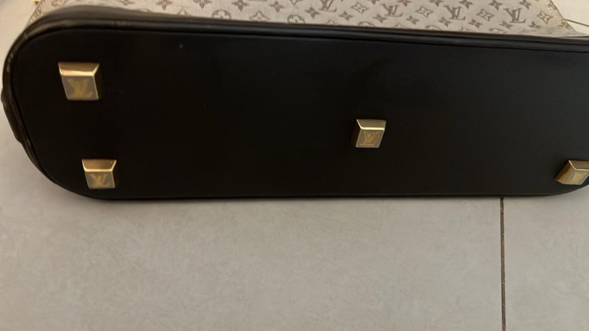 Bolso Louis Vuitton Mini Lin Alma Haut y Portacosmeticos