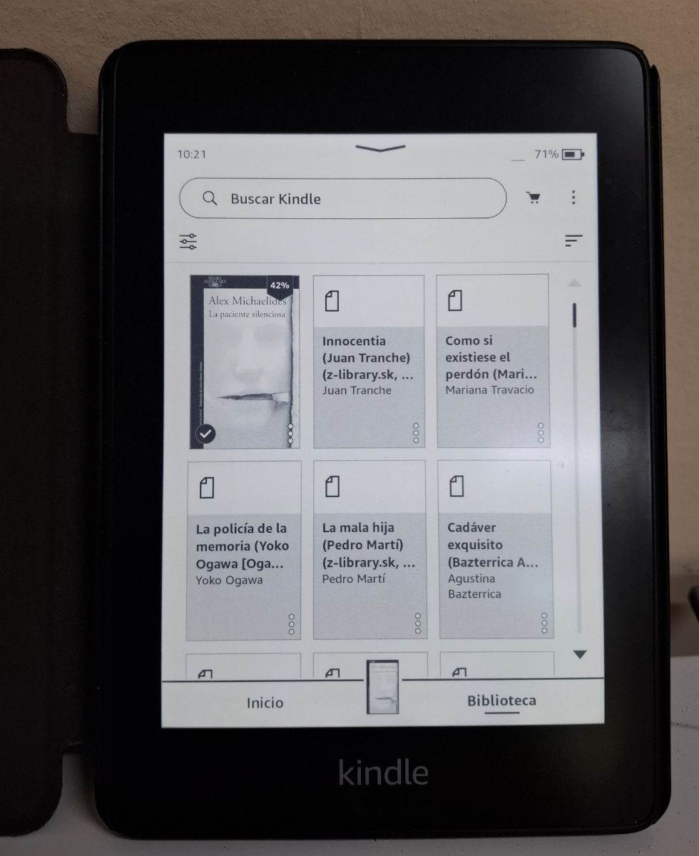 Kindle Paperwrite 10ma. generación negro con funda de encendido automático color negro..