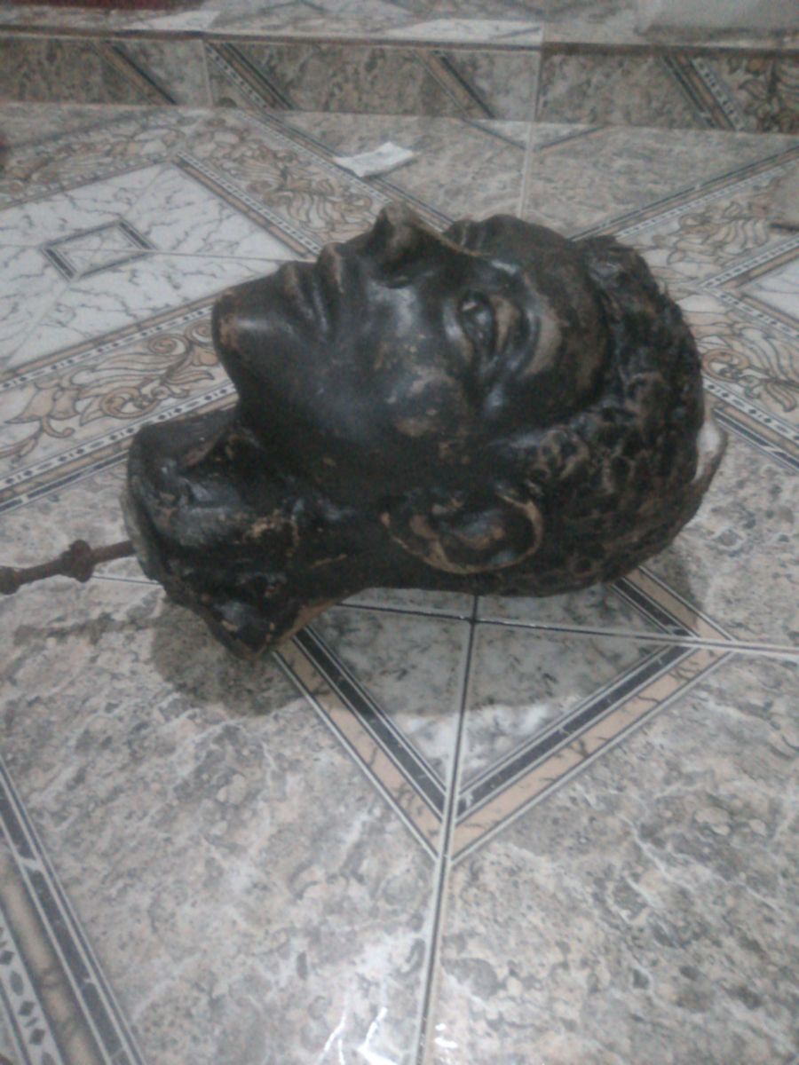 Escultura de cemento Cabeza